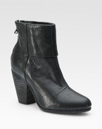 Glimmering leather style with a chunky heel, back zipper and unique fold-over detail. Stacked heel, 3½ (90mm)Leather upperBack zipperLeather lining and solePadded insoleImportedOUR FIT MODEL RECOMMENDS ordering true whole size; ½ sizes should order the next whole size up.