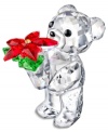 Kris Bear is ready for Christmas, clutching a beautiful poinsettia plant in a Swarovksi crystal collectible that'll shine year after year. Leg engraved with 2012.