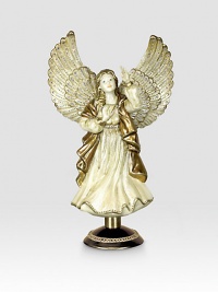 From the Jay Strongwater Angelic collection a palette of creams, golds and silver accents have been painted on this finely detailed Angel Tree Topper.Stand includedCrystalGlassHandmade, hand-painted and hand-set15H X 9W X 5.5DImported