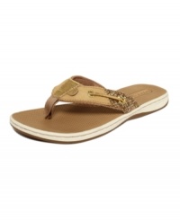 A beach bag essential. Classic boat shoe style lends a preppy vibe to the the Seafish thong sandals by Sperry Top-Sider.