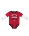 This Nike bodysuit boasts a winning slogan for your little athlete.