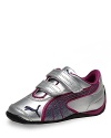 PUMA's fun, flashy metallic sneakers provide support and cutting-edge style for your sporty gal.