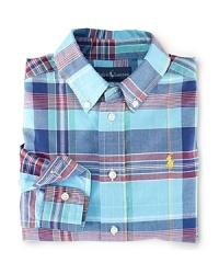 A button-down shirt in crisp woven cotton is perfectly preppy in bold-hued madras.