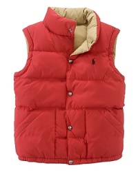 The Reversible Elmwood Puffer Vest is crafted from channel-stitched microfiber for versatility and lightweight warmth.