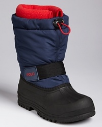 With a toggle top closure and logo velcro tab at the ankle, this cute winter boot is a cinch to strap on and hit the sledding slopes.