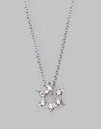 From the Tiny Treasures Collection. This petite diamond-encrusted star with an open center is set in 18k white gold and hangs from a sterling silver chain. Diamonds, 0.09 tcw 18k white gold and sterling silver Chain length, about 18 Pendant diameter, about ¼ Lobster clasp Made in Italy