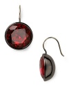 Round faceted stones drop gracefully from sterling silver french wire. Earrings from Juicy Couture.