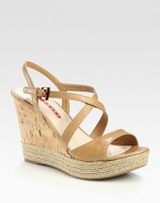 EXCLUSIVELY AT SAKS. Leather criss-cross design with cork wedge and espadrille platform. Cork and hemp wedge, 4 (100mm)Cork and hemp platform, 1 (25mm)Compares to a 3 heel (75mm)Leather upperLeather liningRubber solePadded insoleImported