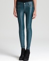 In an icy wash punctuated by edgy zippers, these Parker faux leather pants boast downtown cool.