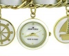 Anne Klein Women's 109384CHRM Gold-Tone White Enamel Accented Nautical Bracelet Watch