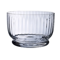 Shapely glass forms bring contemporary refreshment to casual country tables.