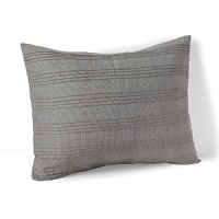 Bring an effortless touch of modernity to your home. Contrasting stripes create a hand-crafted effect on this chic Calvin Klein decorative pillow.