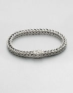 Small sterling silver bracelet in a squared, rope-weave pattern resembling herringbone, with push-lock closure.Sterling silverAbout 3 diam.Imported