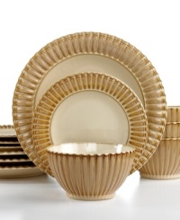 Rustic yet refined, the Terre Monte dinnerware set from Gibson includes four place settings finished with a reactive glaze and dramatic fluted texture. Natural amber tones foster serene everyday meals.