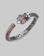 From the Pavé Column Collection. Multi-colored sapphires with white enamel trim for a dazzling design along the wrist.Sapphire Enamel Sterling silver Width, about ½ Sidekick hinge Imported 