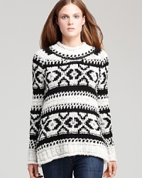 Embrace the chic chalet look in this well-crafted Free People sweater that boasts a classic fairisle print--a timeless seasonal look that never goes out of style.