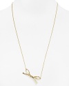 Take a bow. Cast in 12-karat gold plate, this delicate kate spade new york necklace flaunts a sweet simplicity.