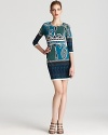 Ali Ro's swirl printed sheath dress lends a timeless look in a cool-hued color palette.