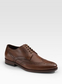 A heritage style for any gentleman of style, crafted in leather with brogue-style perforations. Embossed logo Padded insole Leather/rubber sole Imported 