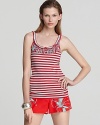 A playful Oonagh by Nanette Lepore tank flaunts fun stripes and fabulous fringe to liven up the most basic staples. Want a bolder look? Contrasting prints are in, so go big and bright--and have the last word on summer style.