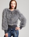 A plush BCBGMAXAZRIA feather jacket creates a sensation of the hautest degree, elevating jeans and evening dresses equally.