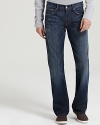 7 For All Mankind's Brett jeans evoke a classic, timeless style, faded and distressed for a rougher, worn-in appearance that matches your laid-back attitude.