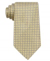 When he's ready to tie one on-all by himself-Nautica offers this neat, lattice-pattern silk necktie as the perfect introduction.