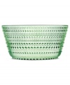 Like dewdrops in the morning sun, the bubbles circling iittala's Kastehelmi serving bowl glisten in pressed glass to reflect all the light at your table. An apple-green hue adds to the tranquil nature of the vintage Oiva Toikka design.