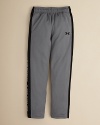 Performance pants with contrast mesh side panels and Under Armour's logo lettering at the cuff.