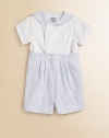 A charming, sailor-inspired set includes a pique button-down shirt and pleated seersucker shorts for a nautical ensemble. Shirt Rounded collar with striped trimShort sleeves with striped trimDouble-breasted button-front with striped trim50% polyester/50% cotton Shorts Button-on shorts Elastic waistbandSlightly pleated67% polyester/33% cottonMachine washImported Please note: Number of buttons/snaps may vary depending on size ordered. 