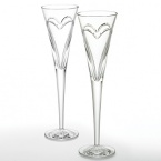 Enhance each toast you make at every special occasion. Where there is Love & Romance, there must be champagne! Whether celebrating your third date, 10th anniversary or millionth declaration of love, what better way to show it than with Waterford Crystal toasting flutes filled with champagne. These flutes were designed with a simple and elegant entwined double heart, representing the love and romance you share. Set of 2; 5 oz.