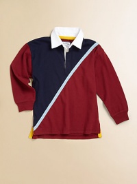 A classic rugby shirt is updated with sporty stripes in a colorblocked design for timeless style.Twill rugby collarLong sleevesButton-frontUneven side-vented hemCottonMachine washImported Please note: Number of buttons may vary depending on size ordered. 