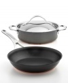 Featuring a double full-cap base, this skillet and sauteuse duo features a full layer of copper sandwiched by two layers of hard-anodized aluminum and protected by an impact-bonded magnetic stainless steel cap. The straight, deep sides of the sauteuse provide extra capacity for searing, braising, stewing and deglazing, while the 10 skillet is the perfect size for an array of cooking tasks, like sauteing, frying and more. Lifetime warranty.