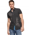 Add some flashy to your basics with this shirt with embroidered detailing from INC International Concepts.