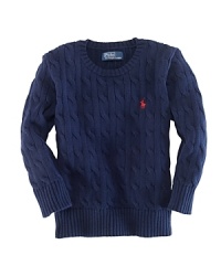 A classic cable crewneck sweater will keep your little one warm with its soft cotton.