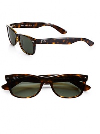 Funky two-tone frames update this modern wayfarer style. Available in black with green lens or havana with brown lens. Plastic Made in Italy 