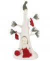 Knitting kind warmth for all, this Snowbabies figurine shows that sharing is caring. Crafted of porcelain bisque from Department 56.