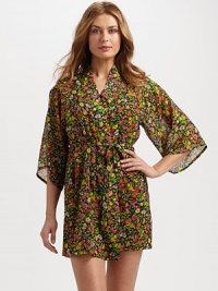 A semi-sheer wrap imparts thoughts of spring with a lush floral print. Three-quarter sleevesSelf-tie waistAbout 35 from shoulder to hemPolyesterMachine washImported