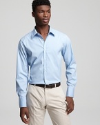 An ultraclean look. Cotton button-front shirt has spread collar, no pockets and a slightly lean fit.