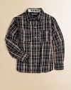 Your little guy will look handsome in this plaid long-sleeve shirt with dual chest pockets. Point collarLong sleeves with button cuffsButton frontFront patch pocketsCotton/polyesterMachine washImported