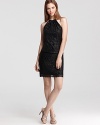 In textured, metallic lace, this Laundry by Shelli Segal dress lends an after-hours look.