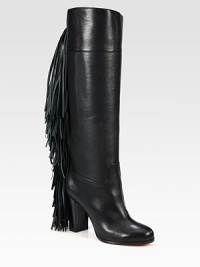 Rocker-chic fringe adds movement to this towering boot of sumptuous Italian leather. Stacked heel, 3½ (90mm)Shaft, 15½Leg circumference, 14Leather upperPull-on styleLeather liningSignature red leather solePadded insoleMade in Italy