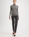 Ultra-soft finespun wool, in a rib-knit turtleneck style.TurtleneckLong sleevesMerino woolDry cleanImported of Italian fabricModel shown is 5'10 (177cm) wearing US size Small. 