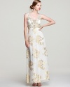 Exuding sophisticated glamour, Sue Wong's metallic detailed gown makes a statement with elaborate, beaded details.