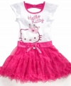 Do a dainty dance. She'll be ready to get pretty in pink with this tutu dress from Hello Kitty.