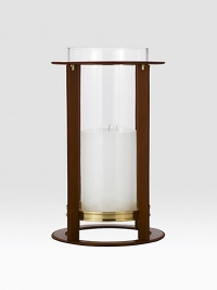 Crafted from gleaming glass, and encased in a supple saddle leather frame to evoke a heritage panache. 19 high6 X 9 candle recommendedLeather, glass and brassImported