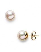 Majorica 10mm round white pearl stud earrings are beautifully crafted using organic man made pearls from Mallorca, Spain. Classic and elegant. Sterling silver and 14 karat post for pierced ears.