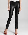 Skinny leather legging, front leather panels down leg, stitching across front and back of knee, elastic waistband.