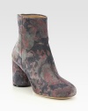 A muted watercolor floral print freshens this elevated suede ankle boot. Self-covered heel, 3 (75mm)Suede upperBack zipLeather lining and solePadded insoleMade in Italy