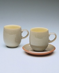 Warm, natural colors and a retro feel combine in this simple, curved mug. From Denby's dinnerware and dishes collection.